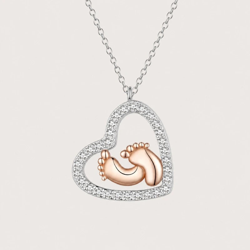 Footprint Heart Necklace crafted in 925 sterling silver with sparkling cubic zirconia