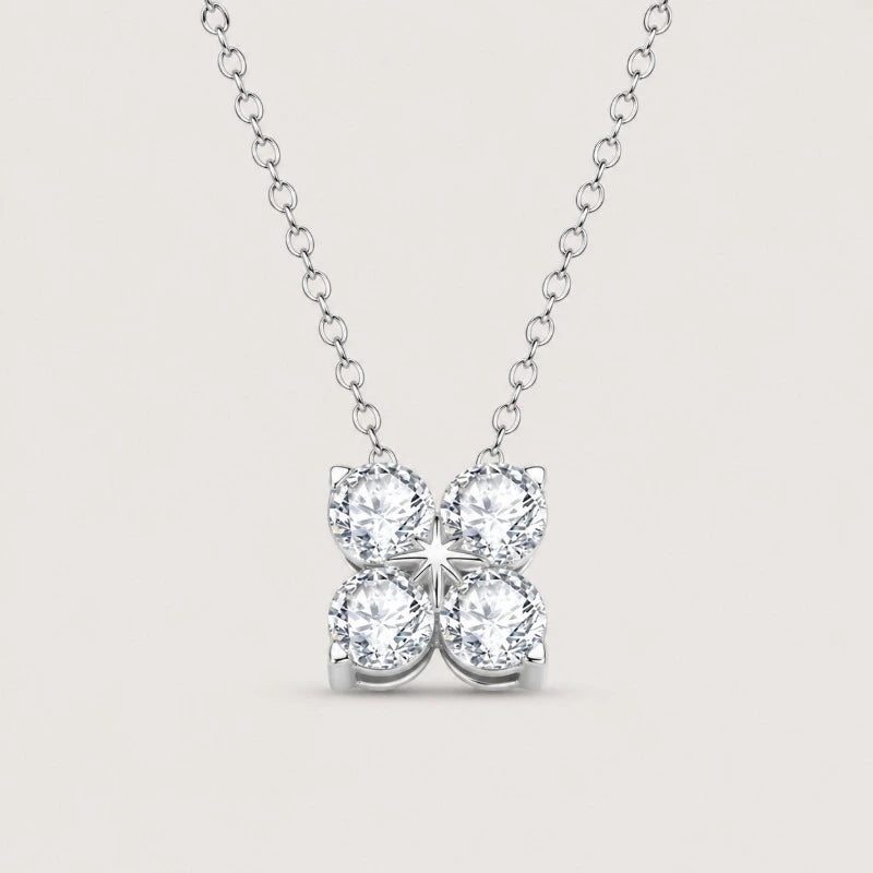 Four leaf clover pendant necklace crafted in 925 sterling silver with four brilliant moissanite stones