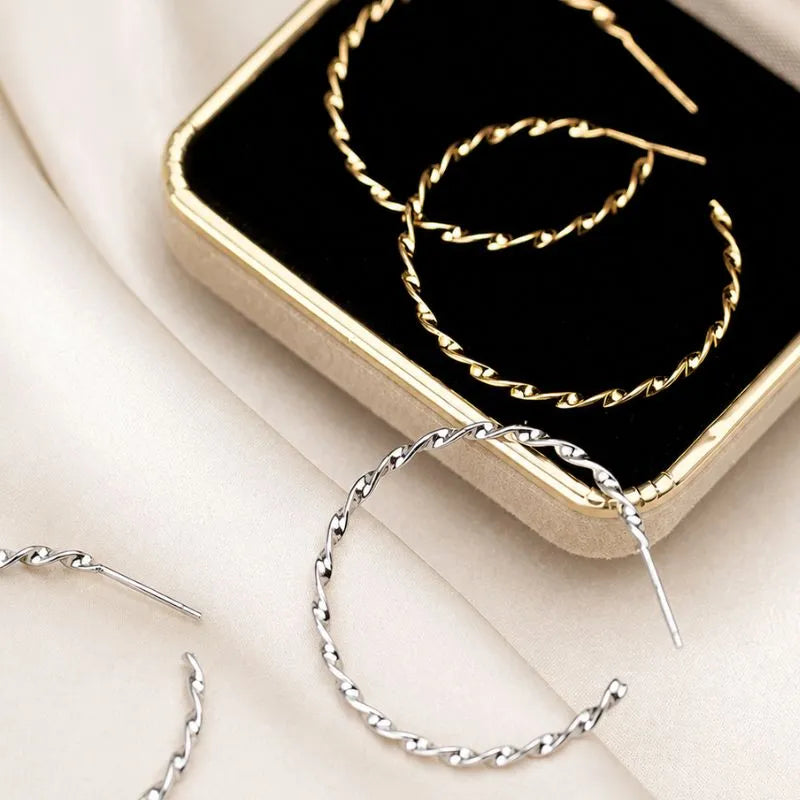 Close-up of the textured surface on a sterling silver and Gold hoop