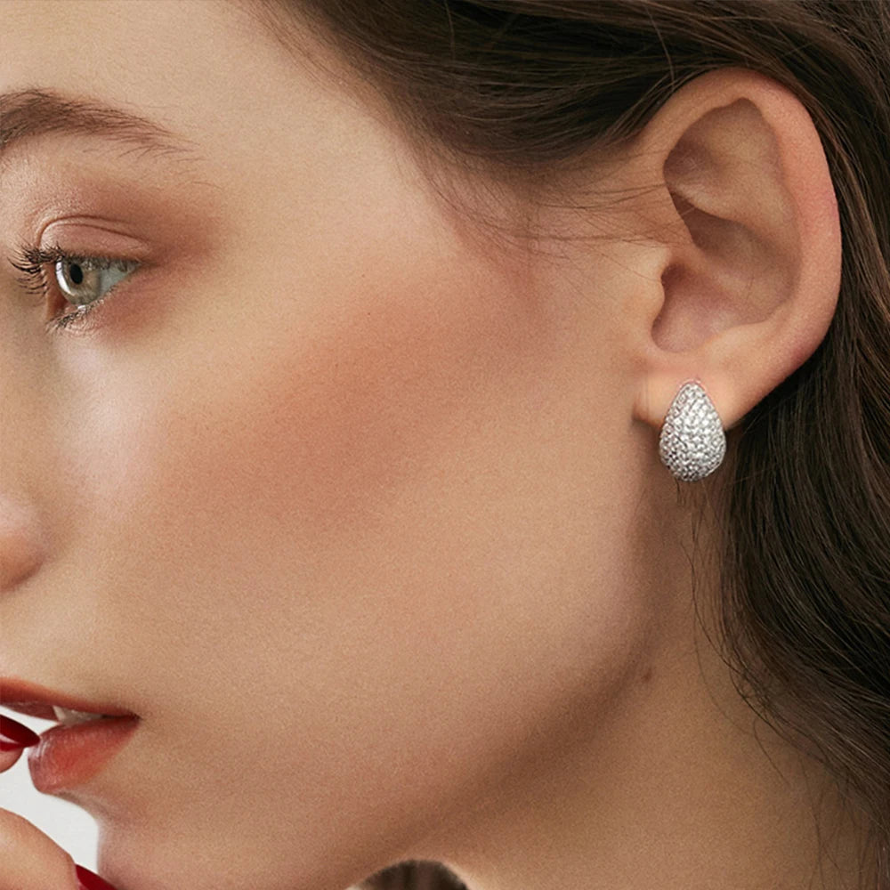 Woman wearing elegant Moissanite Hoop Earrings 