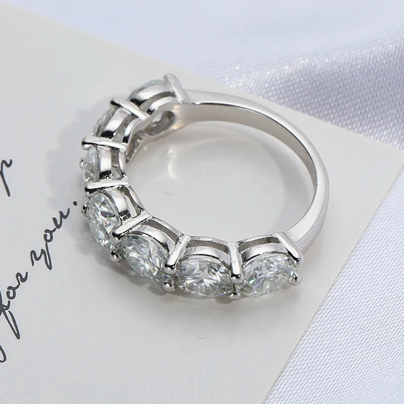 Side view of a sterling silver moissanite ring