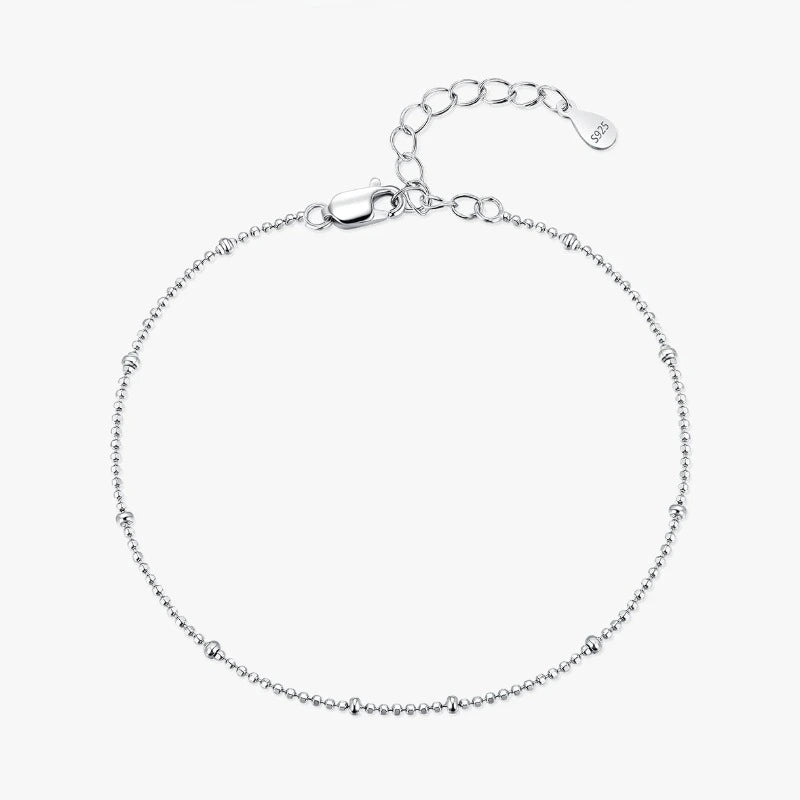 Silver Satellite Bead Bracelet with delicate polished beads and an elegant adjustable chain.