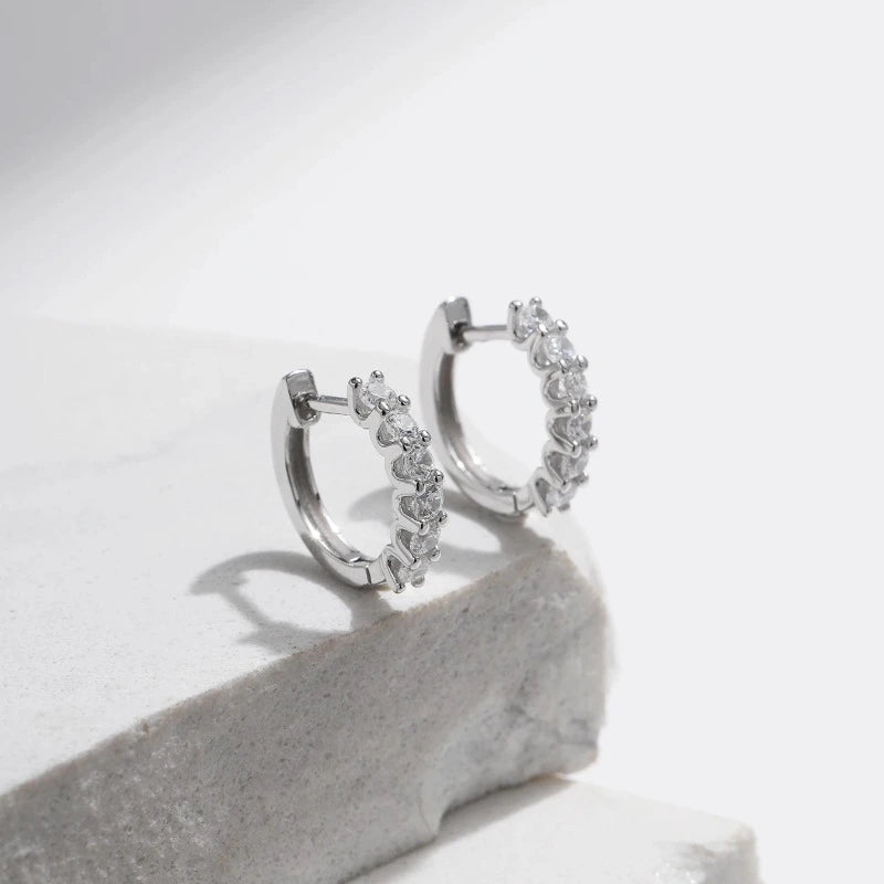 Small Moissanite Hoop Earrings featuring brilliant premium moissanite stones.
