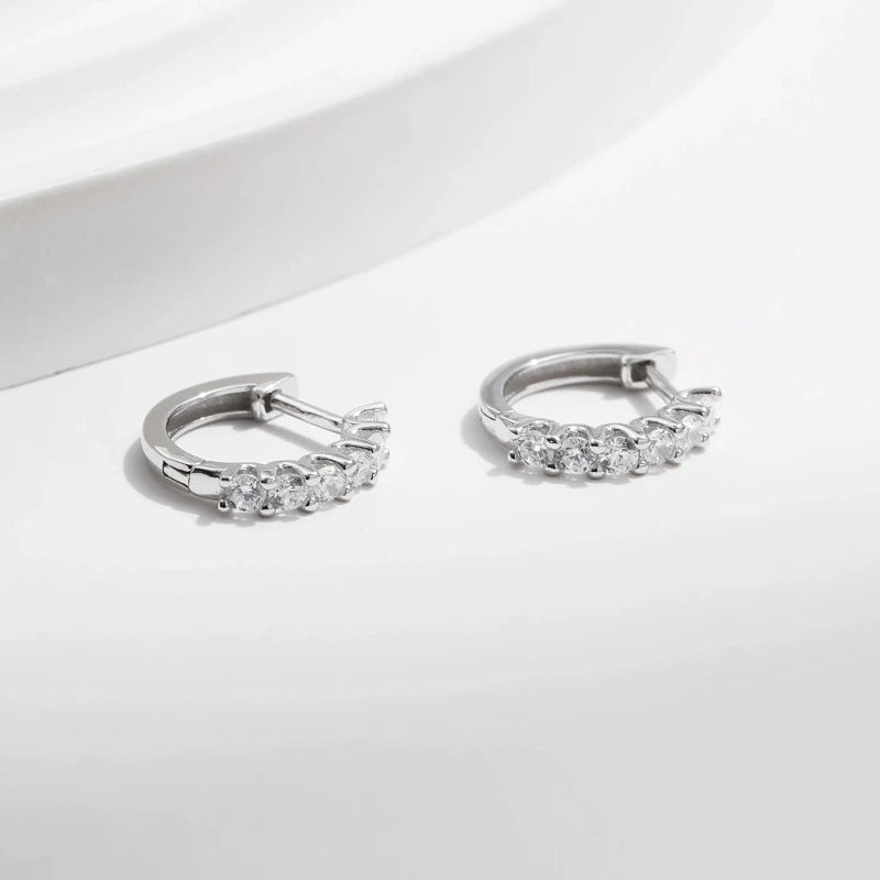Luxury Small Moissanite Hoop Earrings featuring brilliant premium moissanite stones and a secure hinged clasp.