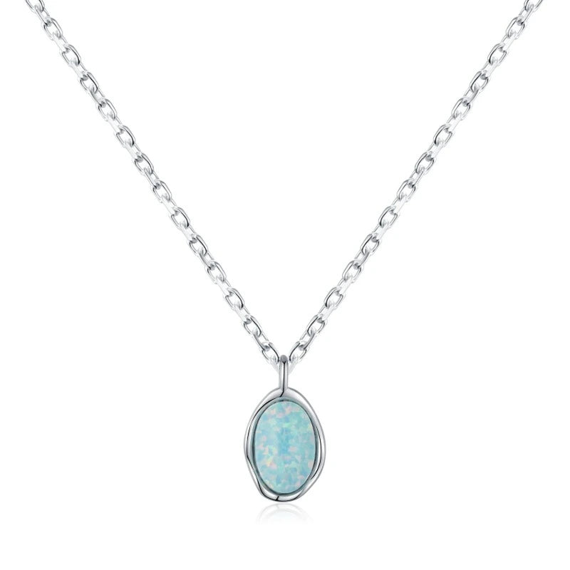 925 sterling silver opal pendant necklace with a delicate oval bezel-set stone and adjustable chain