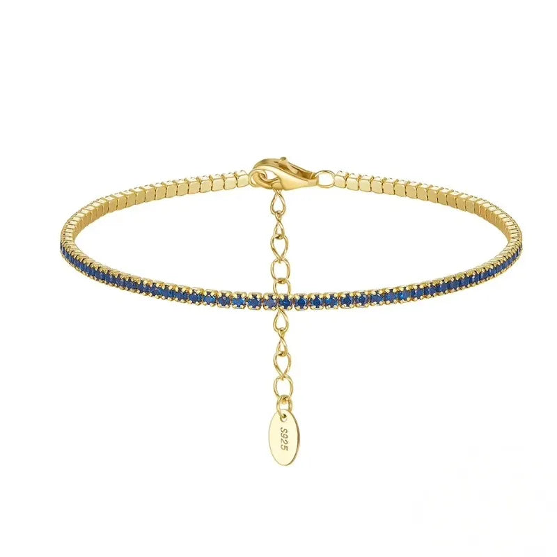 Gold Zirconia Tennis Bracelet featuring brilliant blue cubic zirconia
